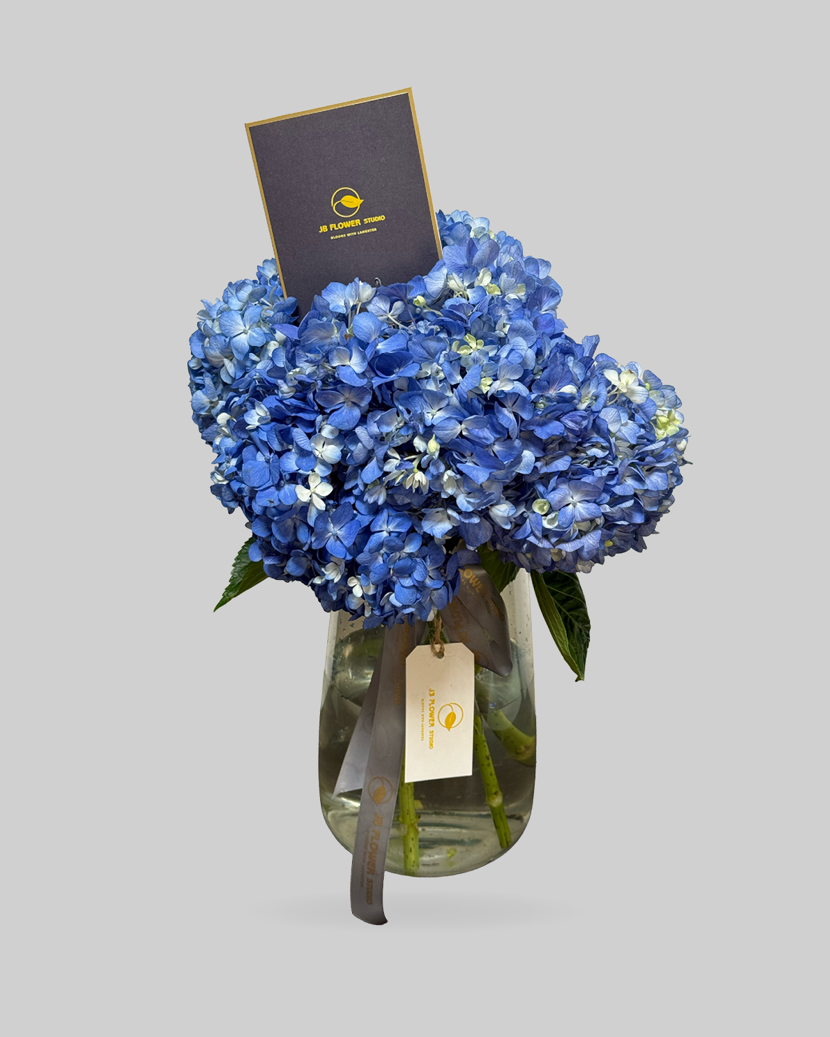 Bold Blue Hydrangea Glass Vase Arrangement