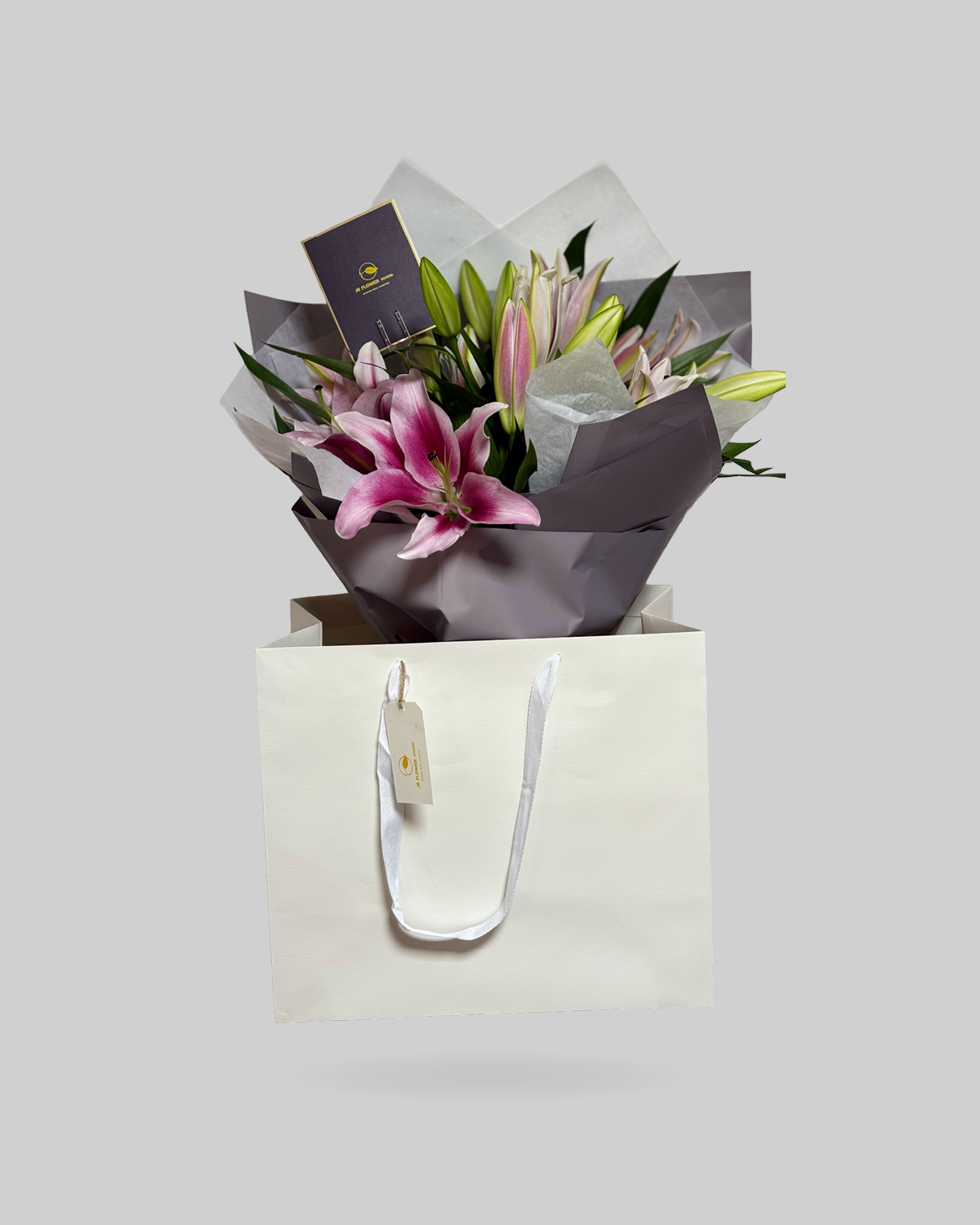 Radiant Pink Stargazer Lily Paper Bag Arrangement