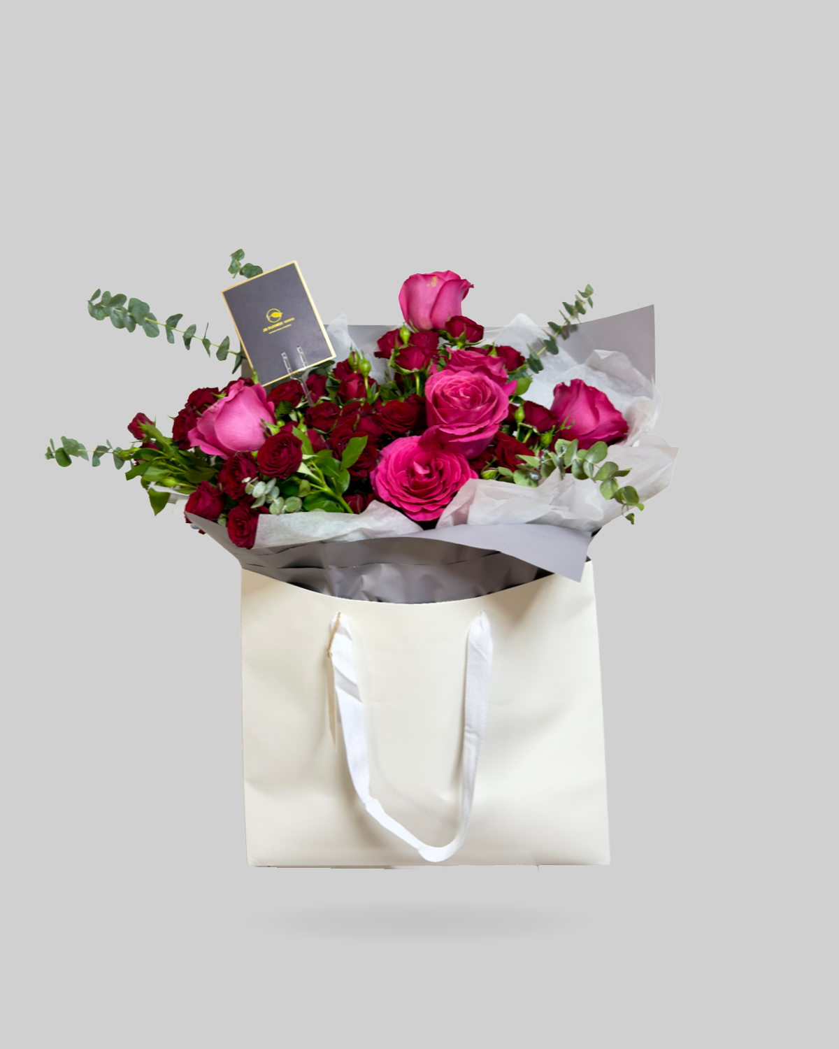 Pink and Red Mixed Rose Paper Bag Arrangement