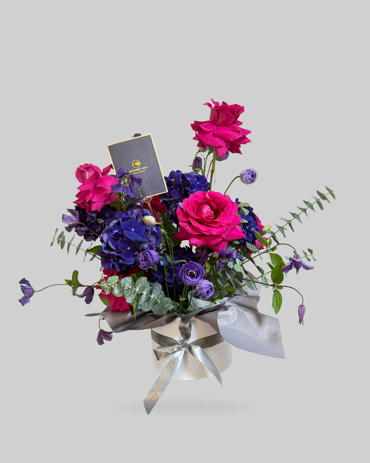 Mixed Purple and Pink Floral Round Box Arrangement