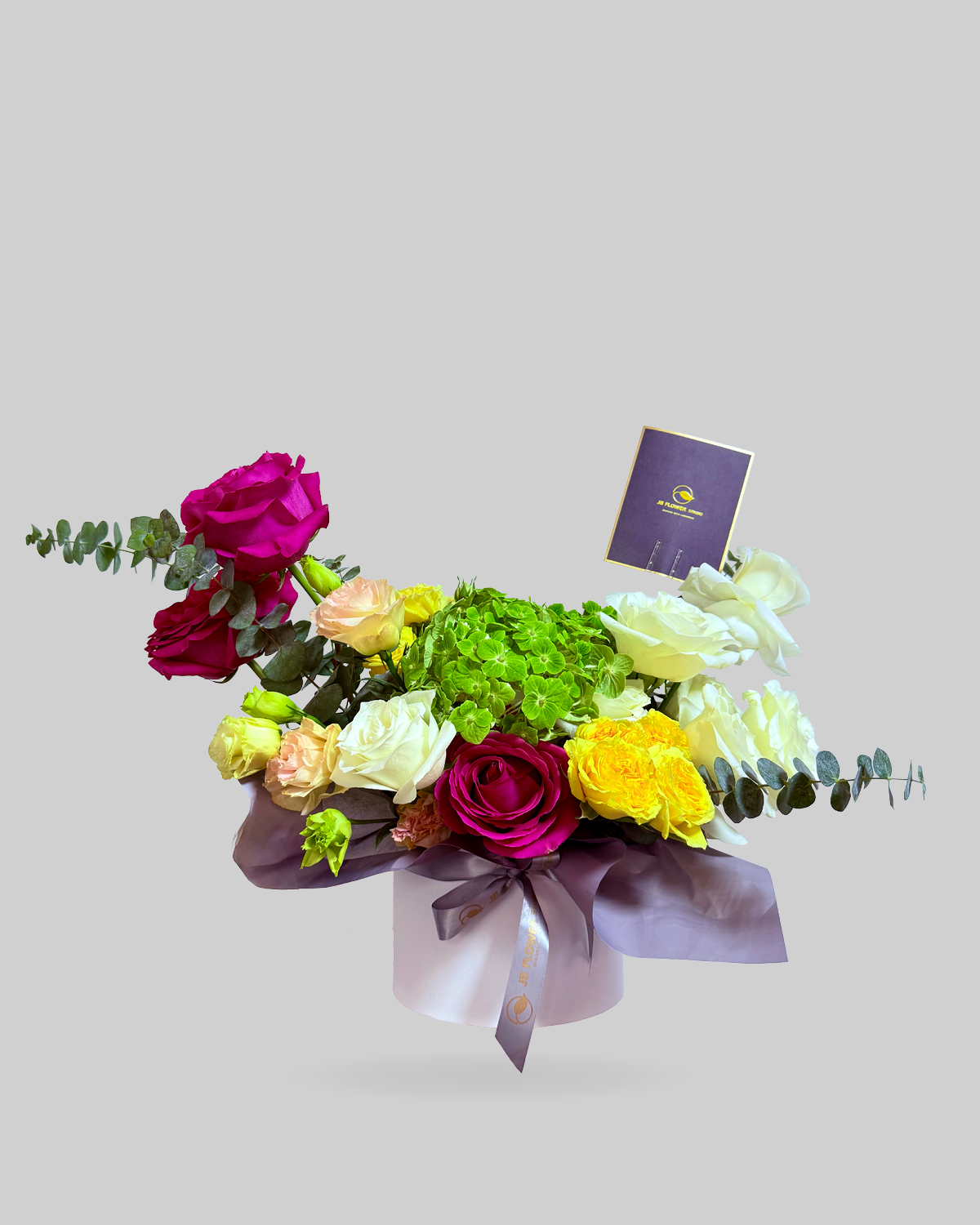 Radiant Multi-Colored Mixed Floral Round Box Arrangement